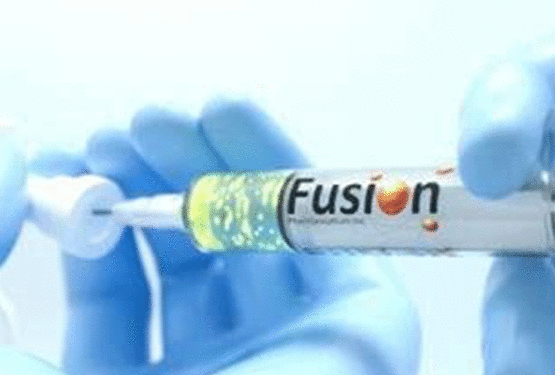 Syringe with Fusion logo on it