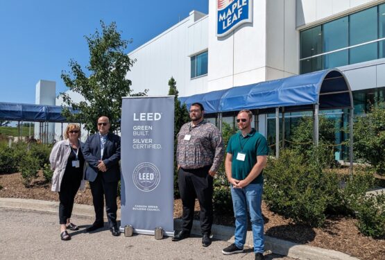 Hamilton's Economic Development Office team at the Maple Leaf Foods LEED certification event on July 20, 2023. (Left to right: Jennifer Patterson, Manager of Business Investment & Sector Development; Norm Schleehahn, Director, Economic Development; Tyson McMann, Business Development Consultant – Agri-Food and Food & Beverage; and Phil Caldwell, Senior Project Manager)