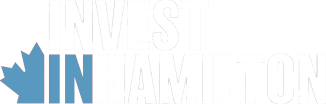 Text logo saying "Invest in Hamilton" in bold with a red maple leaf symbol.