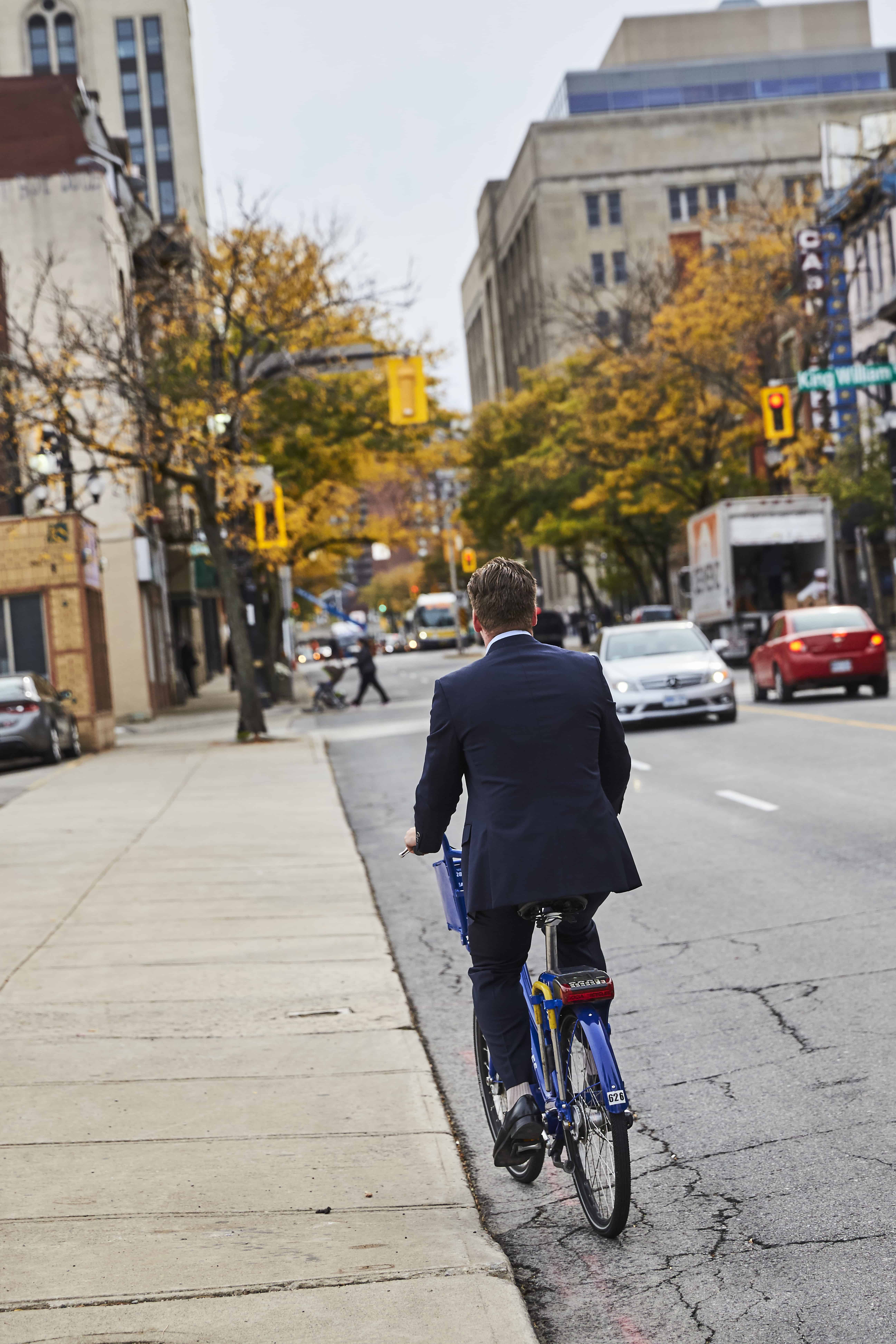 Person on a bike in downtown Hamilton