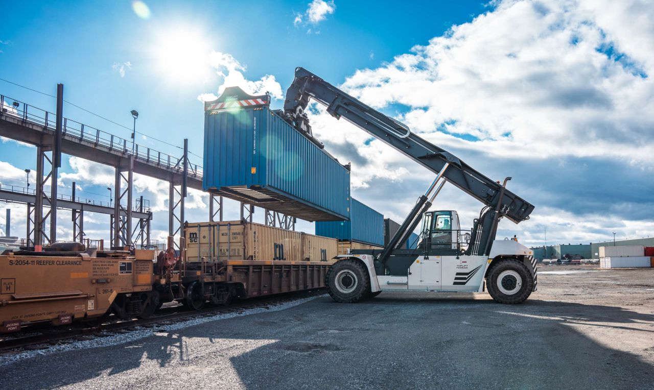 Photo of a container being lifted at Hamilton's port