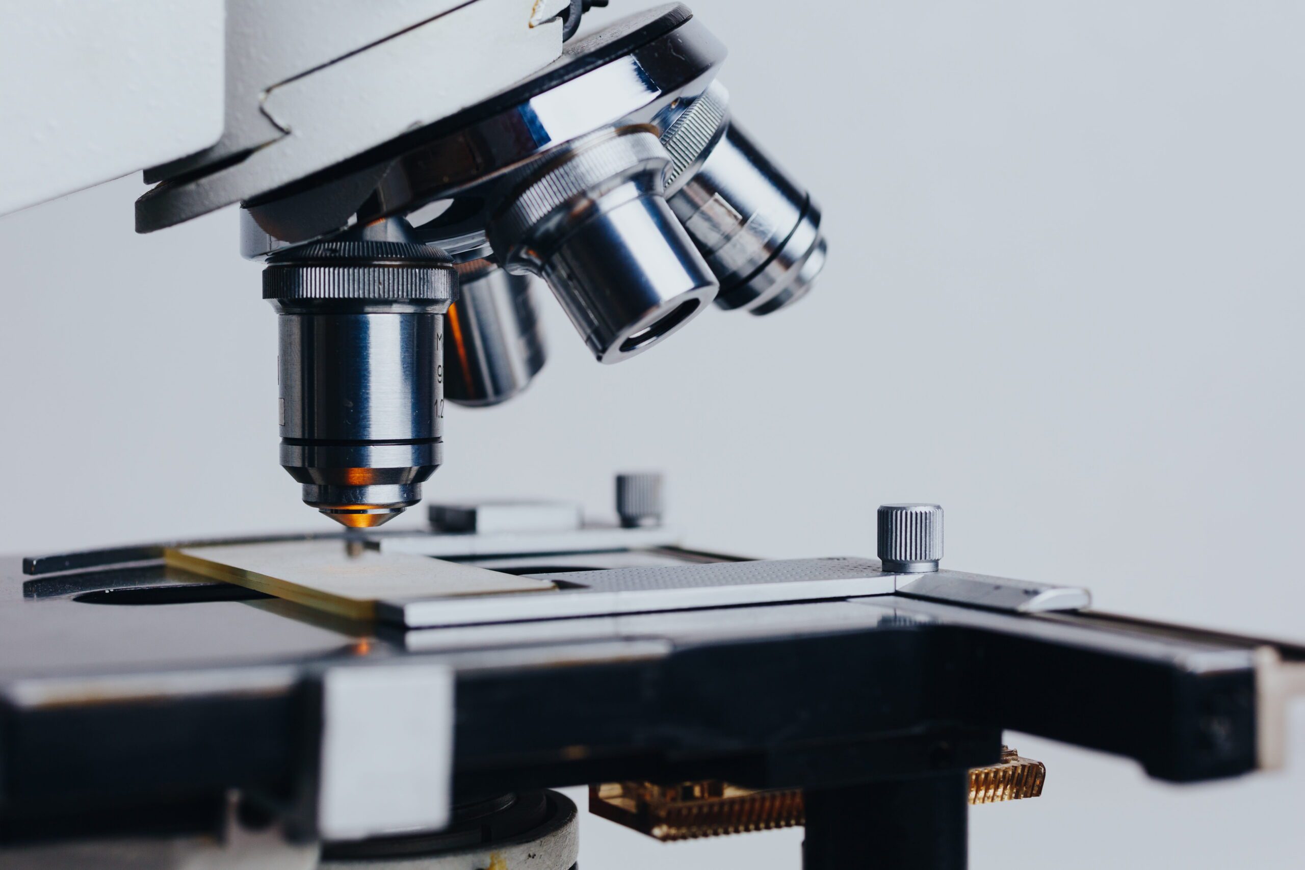 Close-up of a microscope used in life sciences research and biotechnology innovation